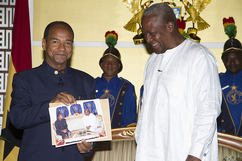 The Venezuelan envoy displaying a photograph with President Mahama